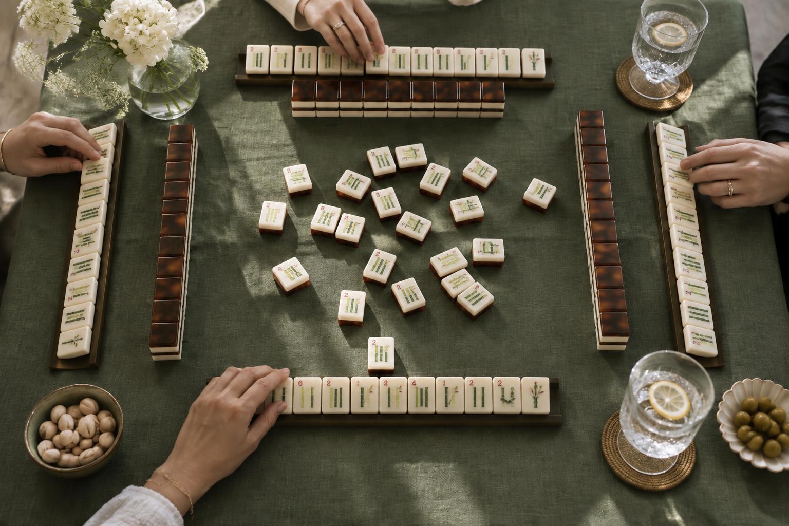 Friends gathering around a mahjong table